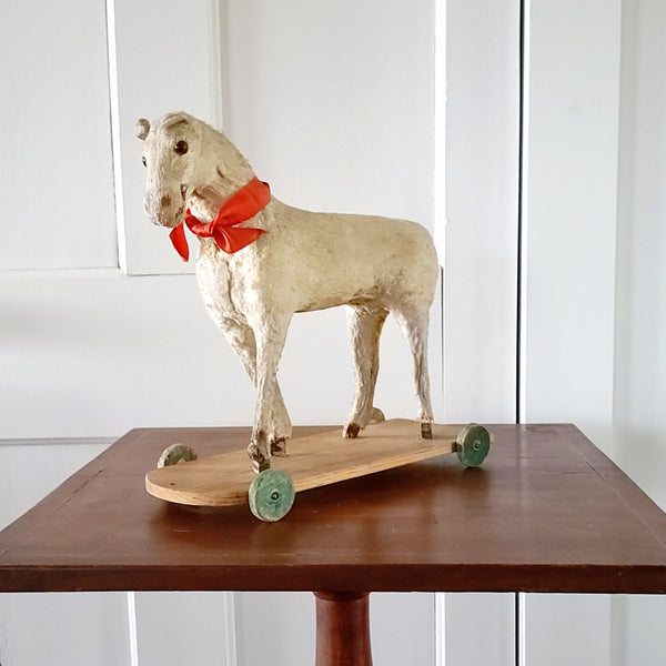 Antique Toy Horse On Wood Base With Wheels