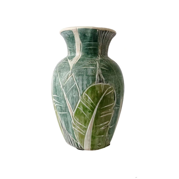 Green Pottery Vase With Banana Leaves