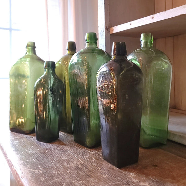 Collection Of Six Antique Green Gin Bottles